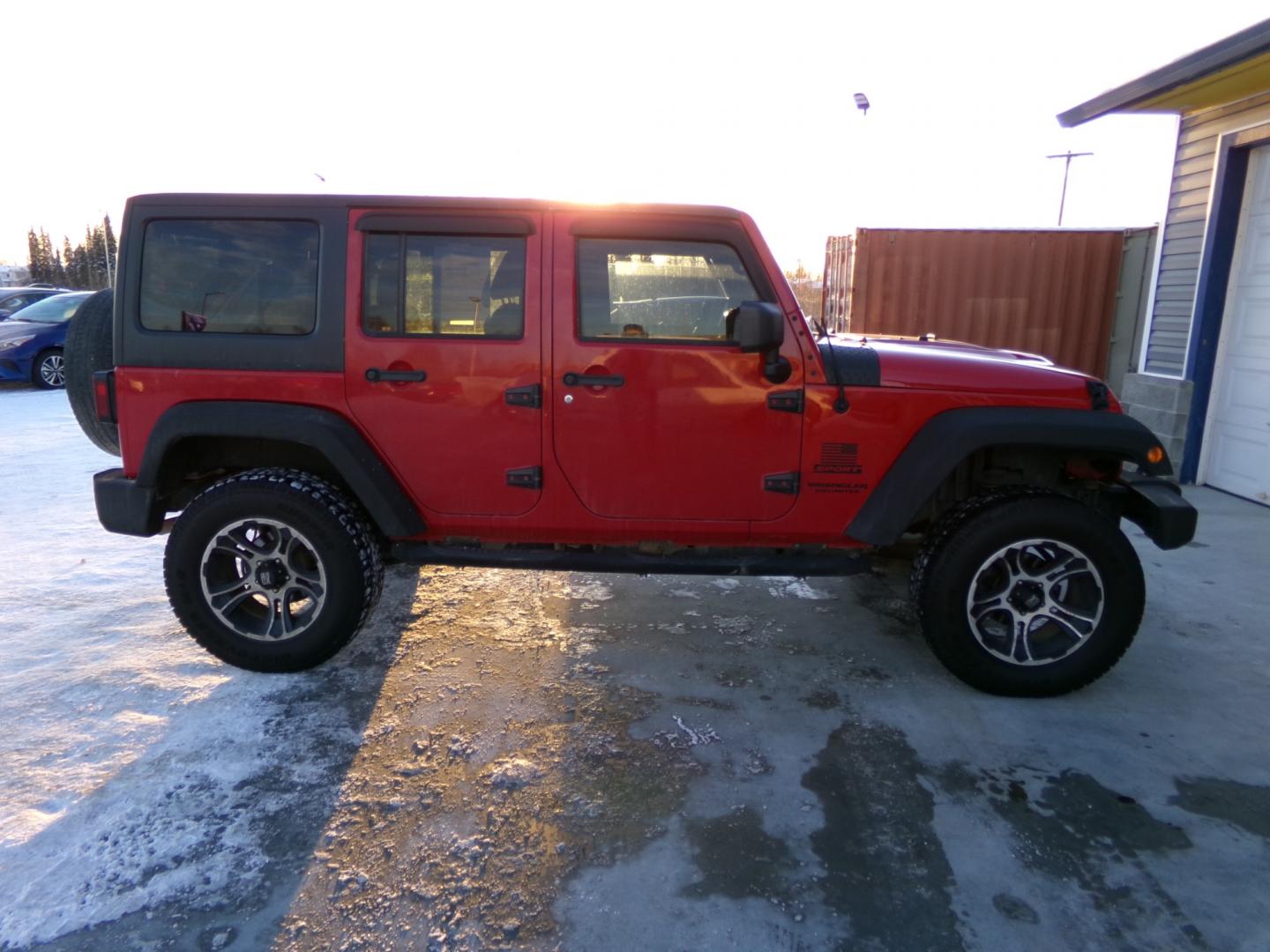 2015 Red /Black Jeep Wrangler Unlimited (1C4HJWEG0FL) with an 3.6L V6 DOHC 24V FFV engine, located at 2630 Philips Field Rd., Fairbanks, AK, 99709, (907) 458-0593, 64.848068, -147.780609 - Photo#2